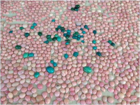 Pink opal and turquoise mosaic at Tucson